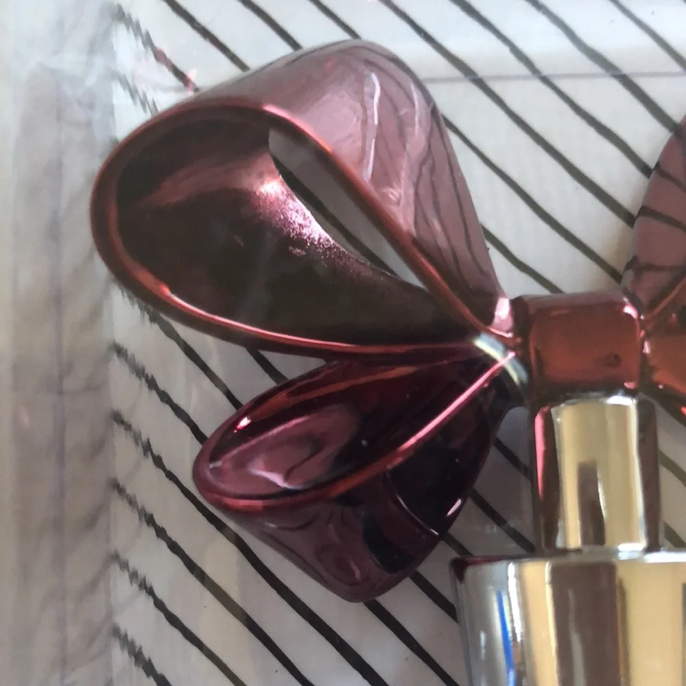Wild Eye Designs dark red shiny bow wine oil stopper